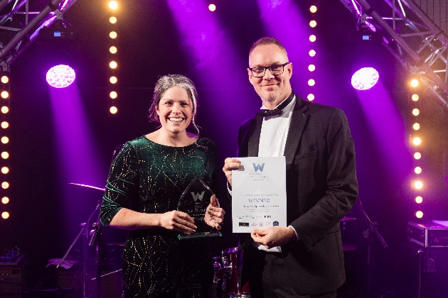 Lucy Harvey receiving her award