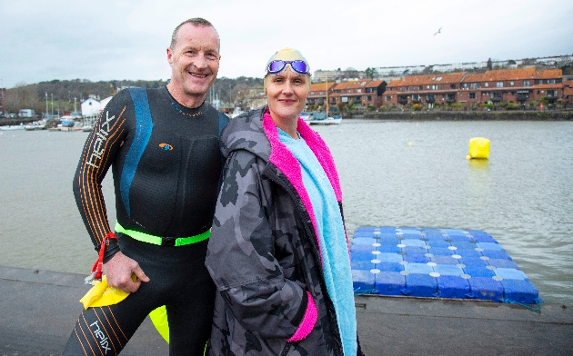 Man and woman in wetsuits Bristol