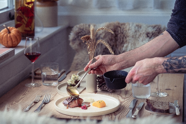 chef serving a meal  at The Ethicurea