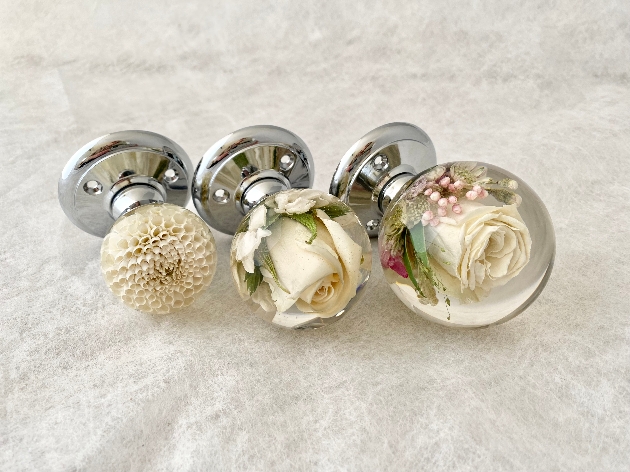 Flower Preservation Workshop's new preserved flower door knobs in white