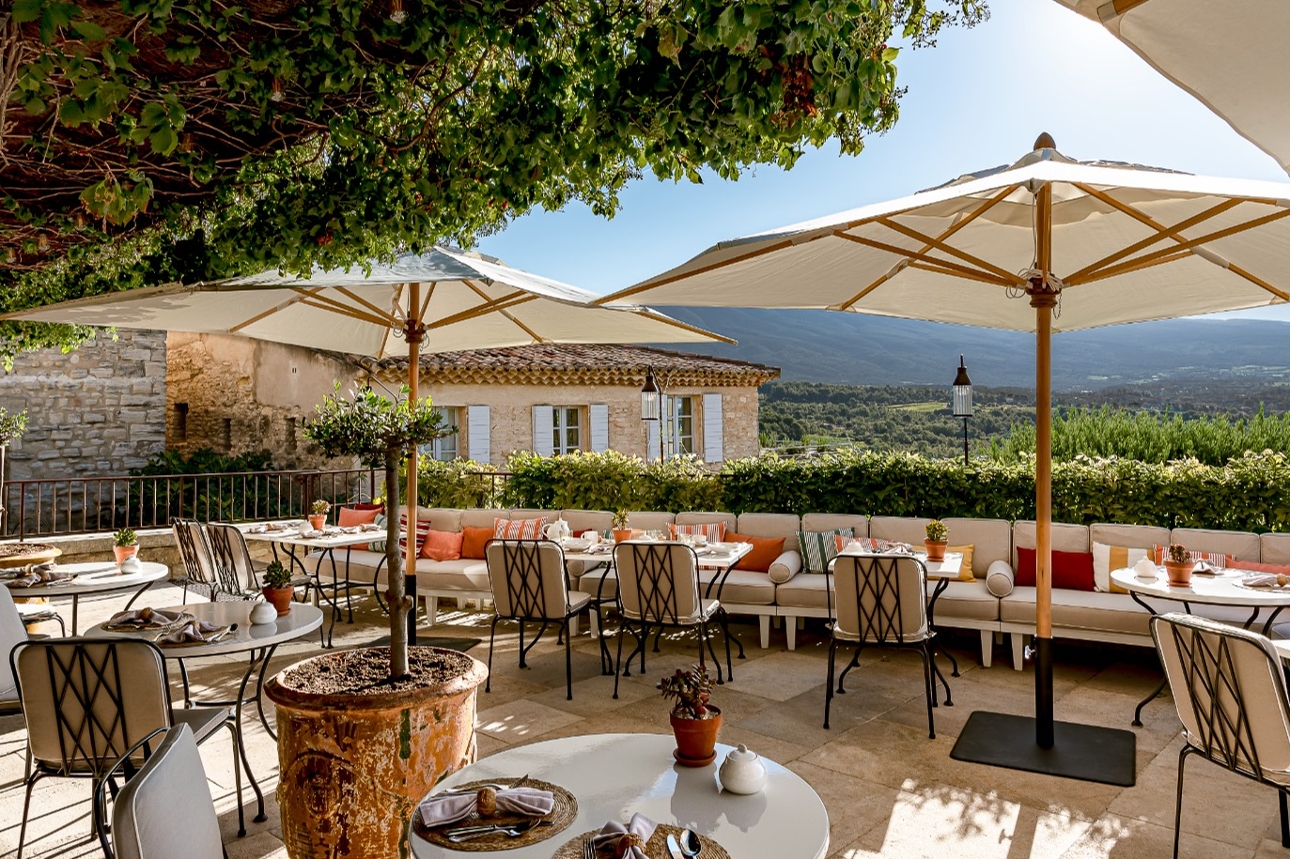 restaurant on terrace with hill views