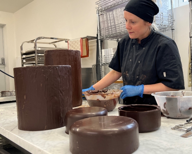 Giant chocolate medicine bottles being made. Luke Jerram