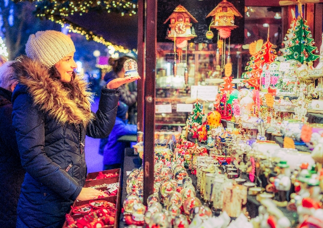 Woman looking at Christmas decorations