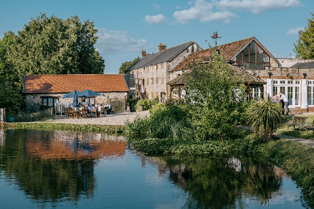 View of Hornsbury Mill across the lake