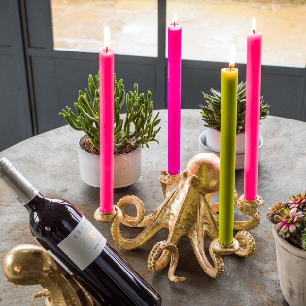 gold octopus candle holder with hot pink candles